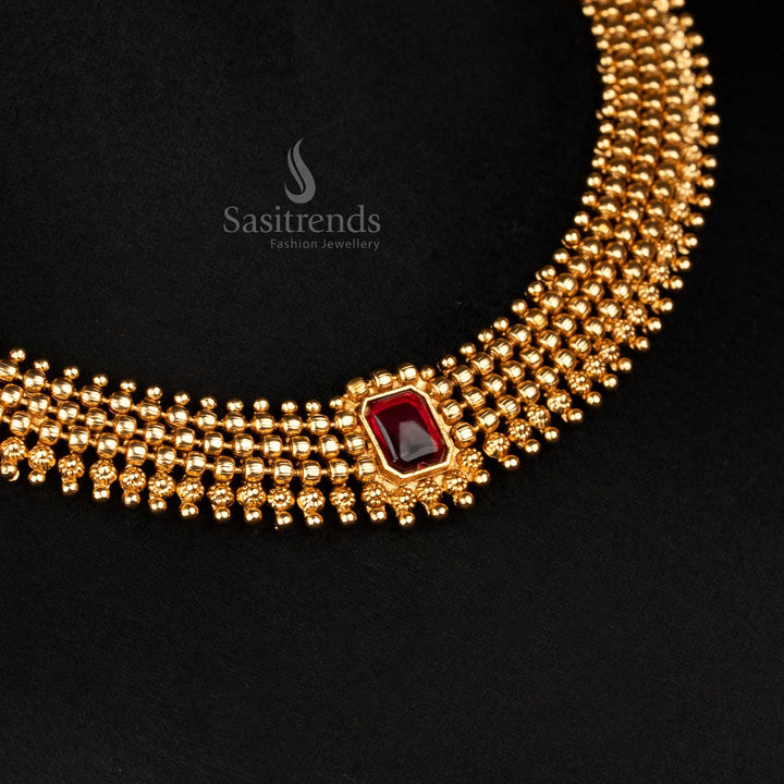 Heritage-inspired matte gold plated ball chain necklace set with glowing ruby rectangle stone and matching stud earrings – a traditional jewellery set reflecting timeless Indian craftsmanship – Sasitrends