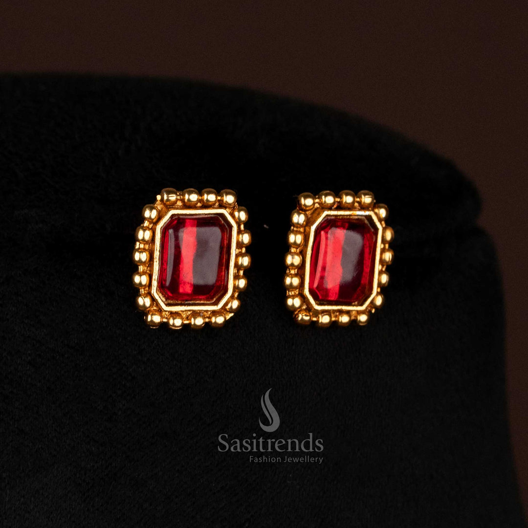 Majestic matte gold ball chain earrings set with deep ruby rectangular centre stone and co-ordinated stud earrings – regal traditional jewellery for bridal and wedding ceremonies – Sasitrends