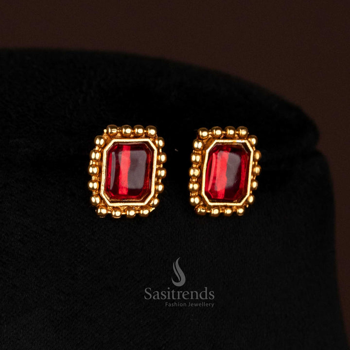 Majestic matte gold ball chain earrings set with deep ruby rectangular centre stone and co-ordinated stud earrings – regal traditional jewellery for bridal and wedding ceremonies – Sasitrends