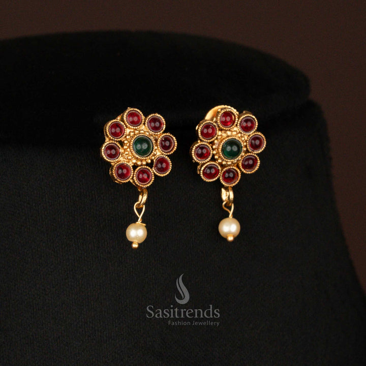 Traditional matte gold pendant Earrings in ruby-green with floral round pattern and pearl hanging – ideal for wedding and pooja wear – Sasitrends