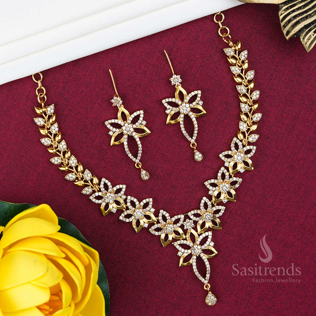 Temple-style floral pendant jewellery set in matte gold with AD crystals, combining graceful South Indian charm and modern party wear glamour for festive elegance by Sasitrends