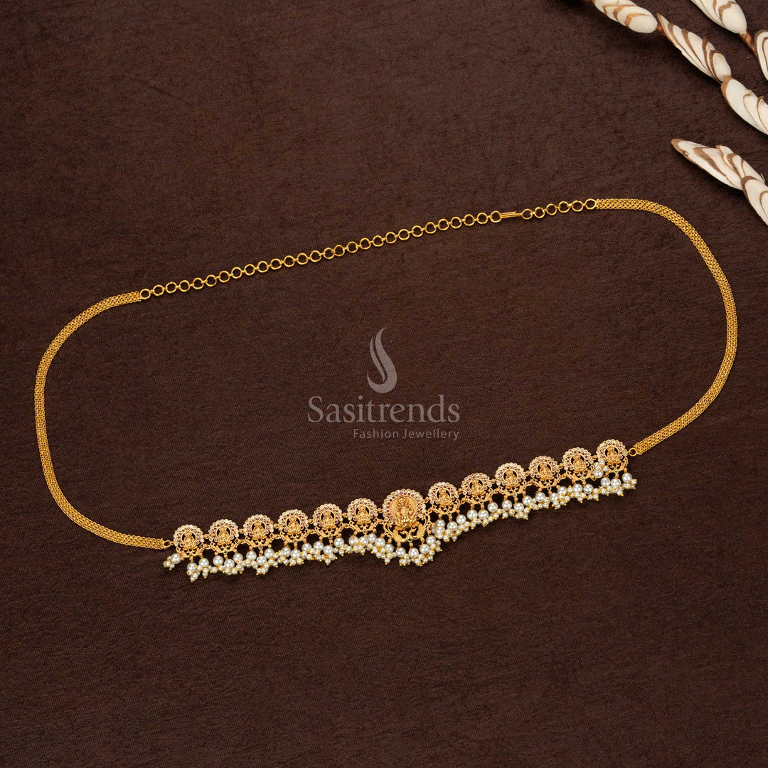 Magnificent premium temple matte gold plated hip belt featuring an intricate Lakshmi engraving with full pearl adornment, an epitome of regal wedding jewellery - Sasitrends