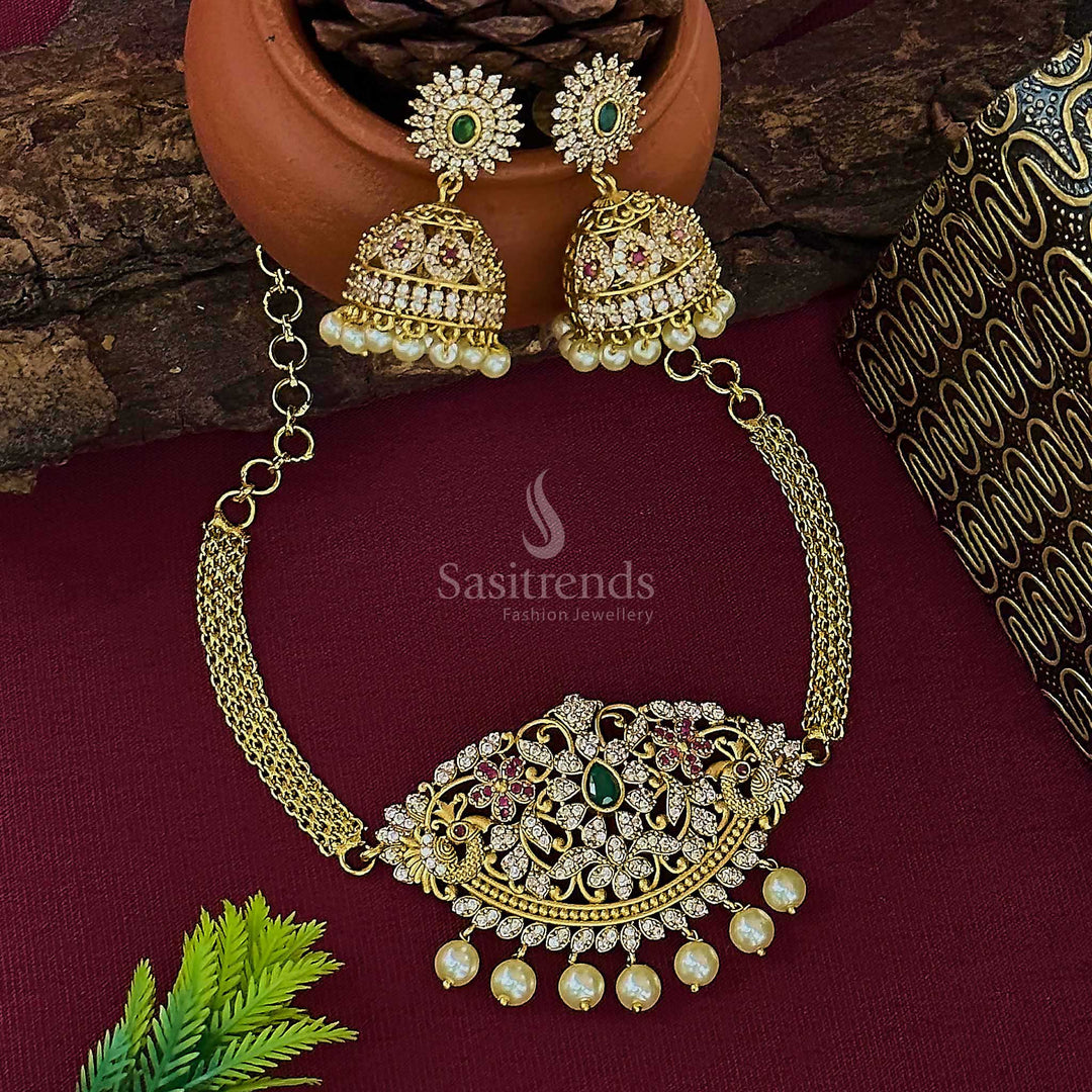 Latest temple matte gold plated floral peacock choker jewellery set designed with intricate detailing, sparkling AD stones, and matching jhumkas for an elegant ethnic statement look – Sasitrends
