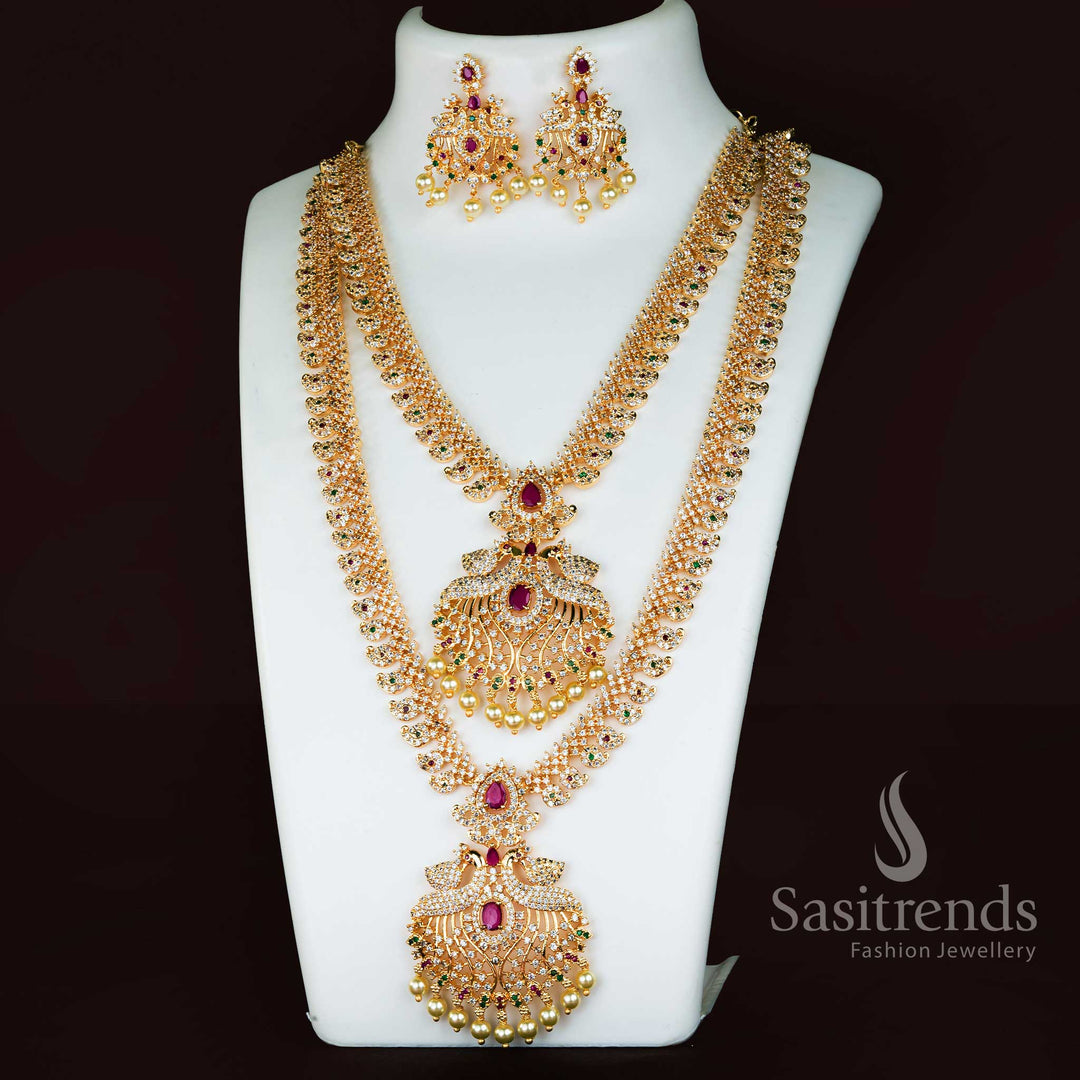 Majestic peacock-inspired matte gold plated interchangeable jewellery set featuring a central stone changeable design, glimmering American diamonds, and classic pearl drops – Sasitrends