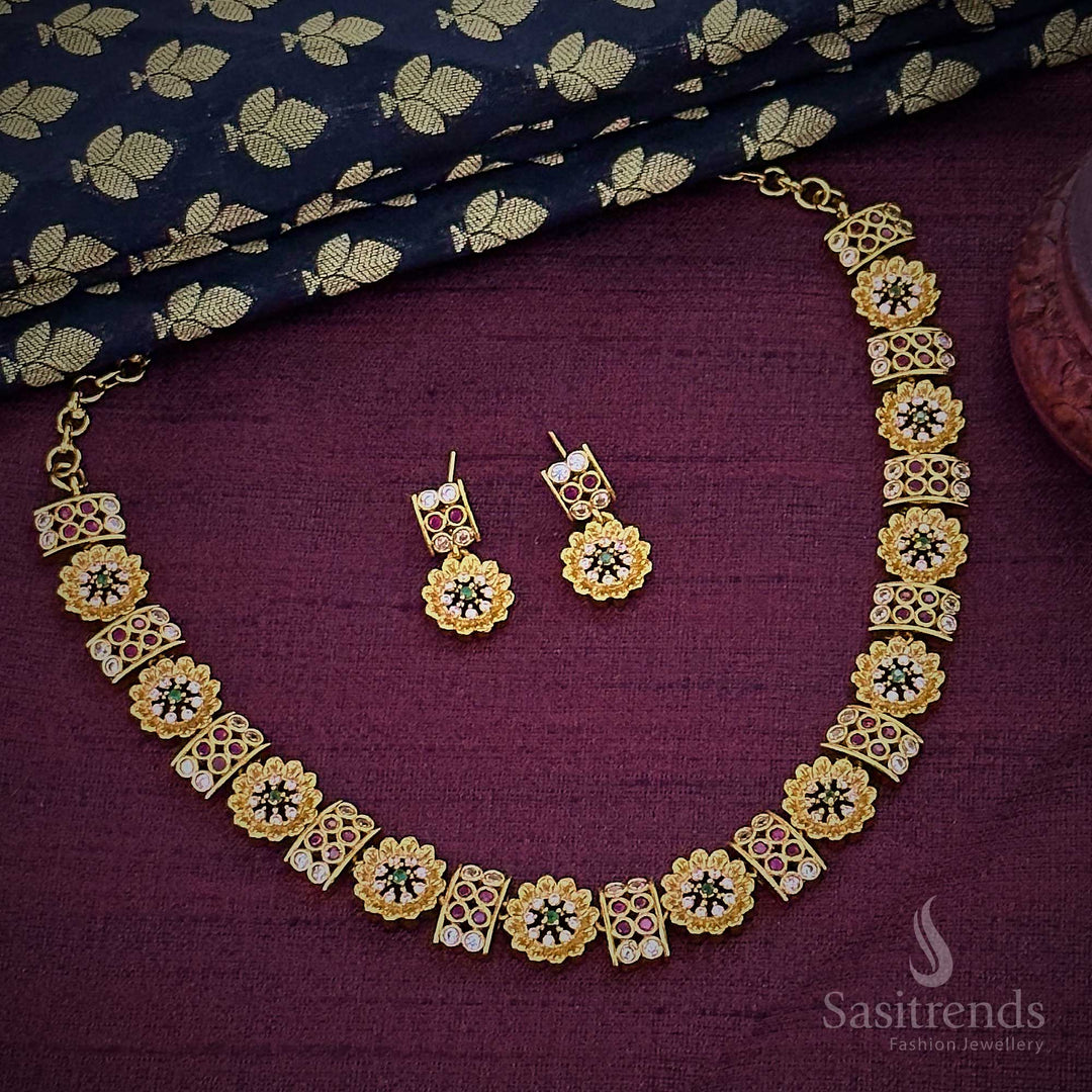 Stunning temple matte gold plated floral and rectangular pattern jewellery set with emerald green, ruby, and AD stones – an elegant fusion necklace designed for traditional ethnic wear – Sasitrends