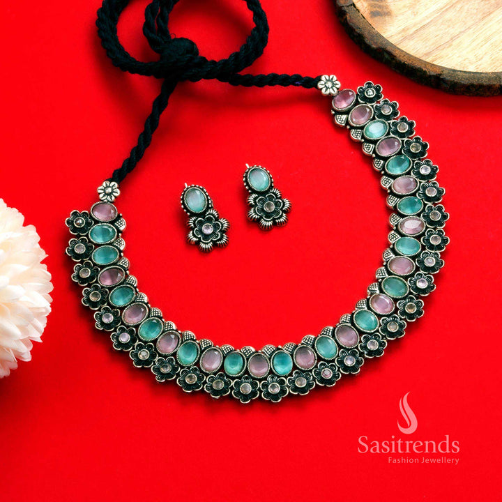 Luxurious antique finish oxidised floral necklace set with mint-pink oval stones and detailed earrings- Sasitrends