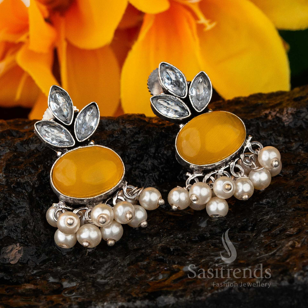 Radiant oxidised earrings adorned with yellow Monalisa gemstone, sparkling AD stone accent and elegant pearl hanging – perfect festive fashion jewellery – Sasitrends