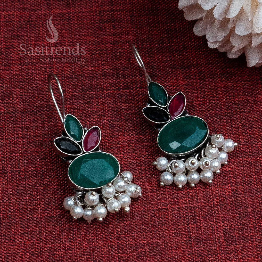 Green-ruby-black stone oxidised earrings with pearl drop and artistic hook motif – fusion wear jewellery with a vibrant ethnic blend – Sasitrends