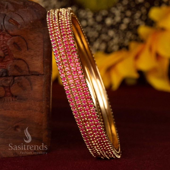 Elegant traditional ruby coloured micro gold bangles with shimmering American diamonds in a polished round stone finish – graceful one gram jewellery set for festive ethnic looks – Sasitrends