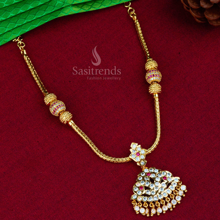 Auspicious Attigai necklace in micro gold with sparkling American diamonds and intricate temple-style designs, crafted for festive traditional jewellery wear and spiritual celebrations – Sasitrends