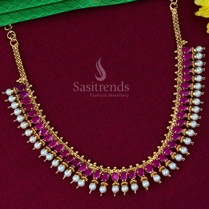 Elegant traditional micro gold plated Thilak motif necklace with ruby stones and sparkling American diamond highlights, perfect for classic South Indian jewellery glamour and cultural charm – Sasitrends