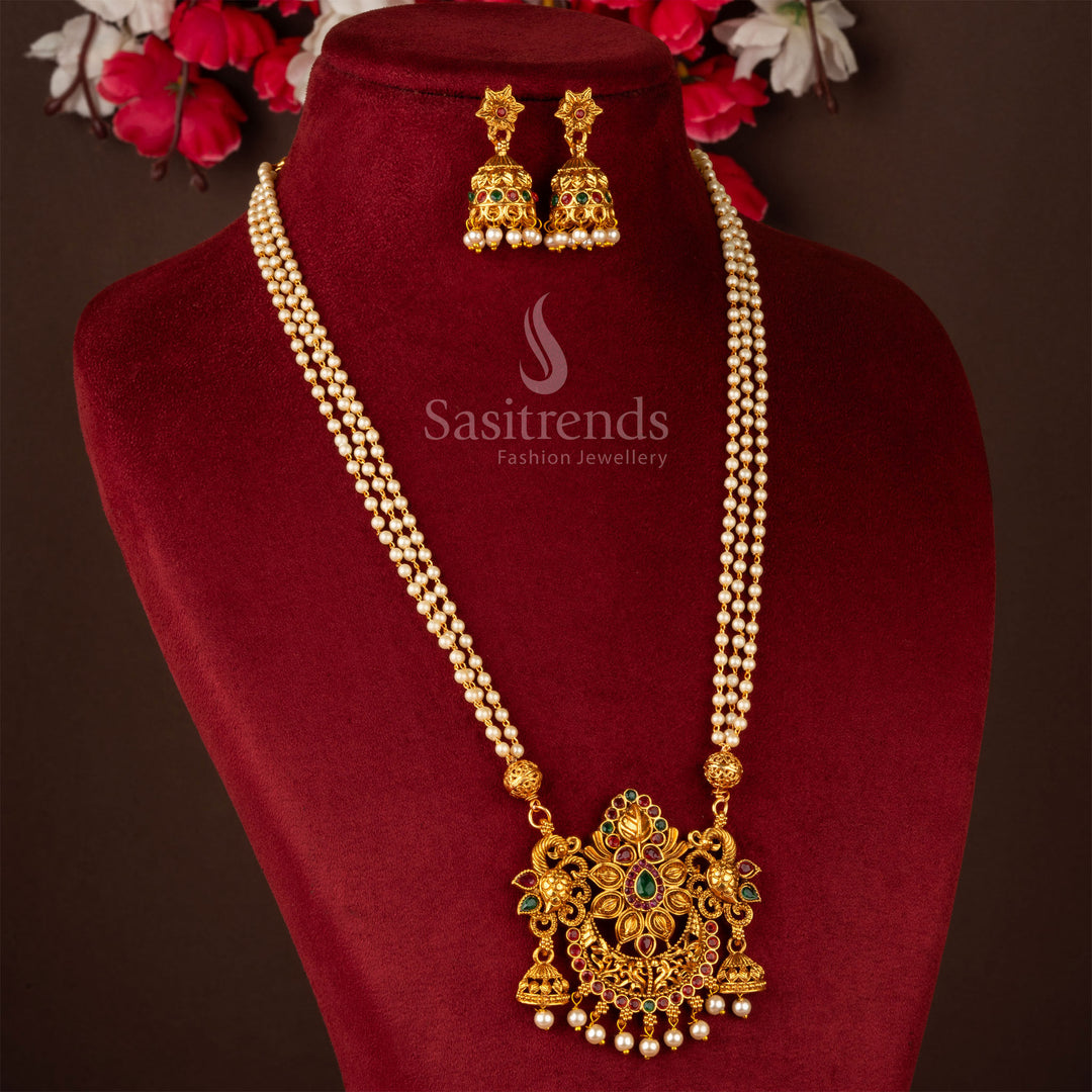Traditional matte gold temple flower necklace set with ruby-green fusion floral pendant and jhumkas, an ideal blend of vibrant tradition for ethnic celebrations – Sasitrends