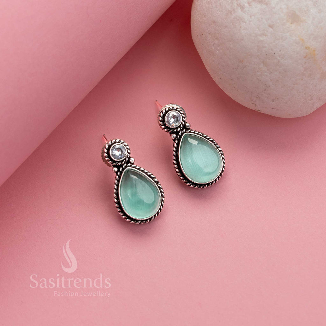 Elegant mint toned Monalisa stud earrings with oxidised silver finish and AD spark – ethnic office wear jewellery for modern women – Sasitrends