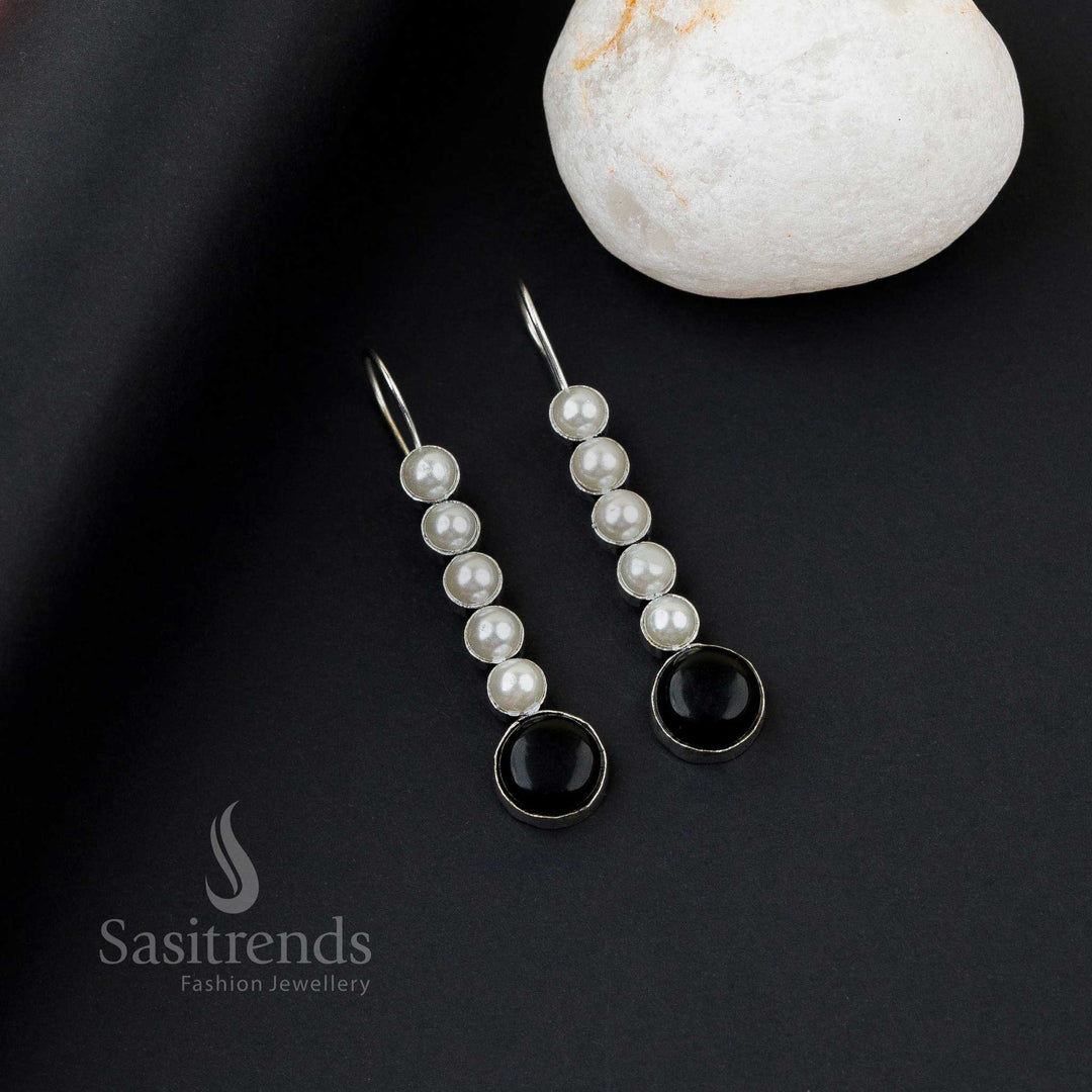 Radiant black oxidised silver earrings with five pearl line, Monalisa stones and captivating twist glow – perfect office wear jewellery by Sasitrends