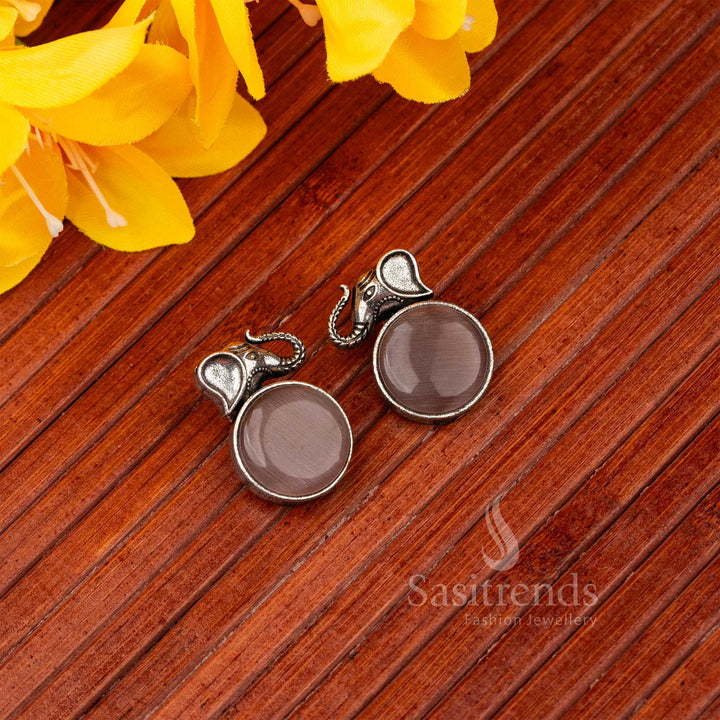 Royal Dark Pink Oxidised Silver Elephant Designer Earrings Embellished With Carved Art And Sparkling Monalisa Stone – A Floral Inspired Statement Jewellery Piece - Sasitrends