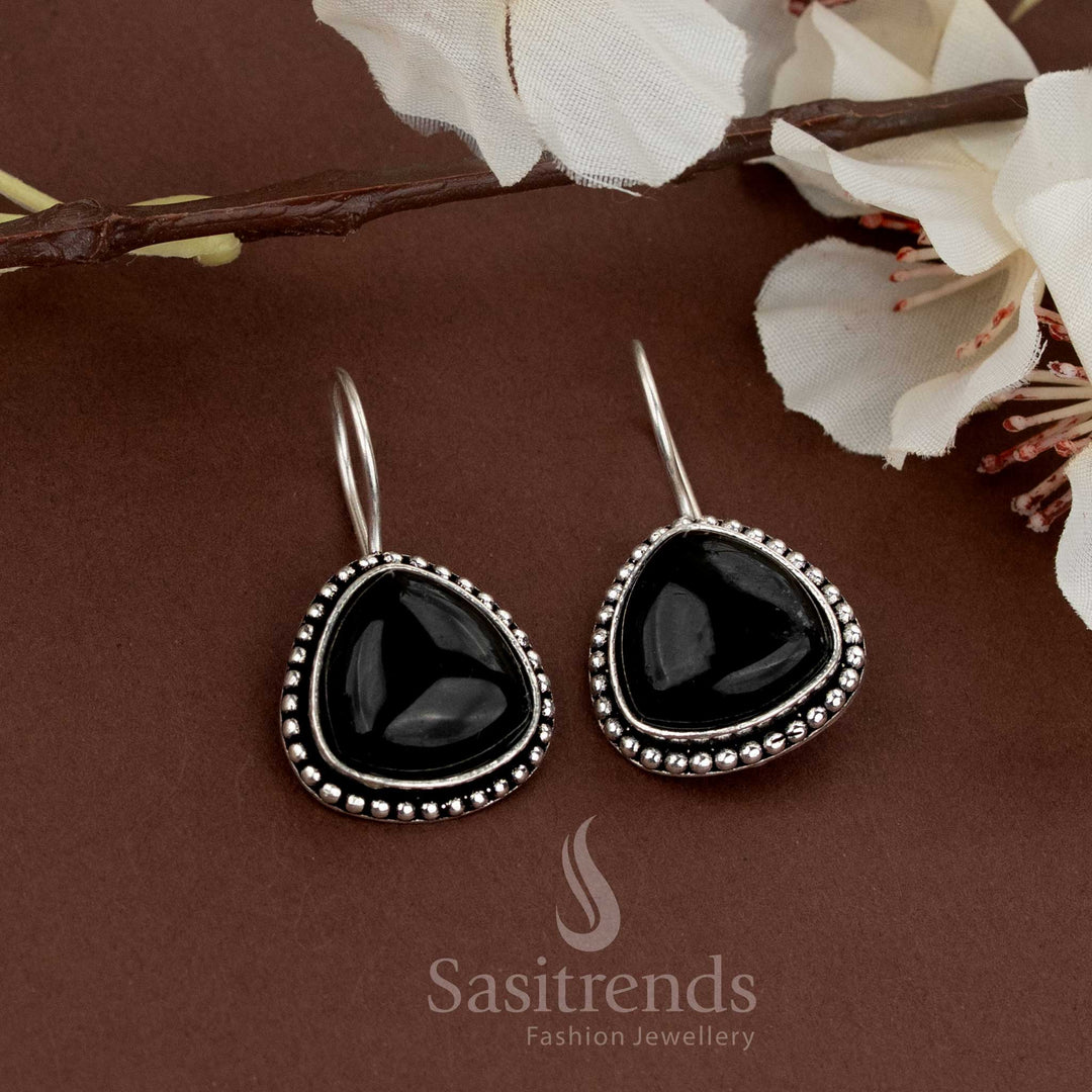 Oxidised teardrop earrings featuring a black natural stone framed with beads perfect for regular wear and festive functions from Sasitrends