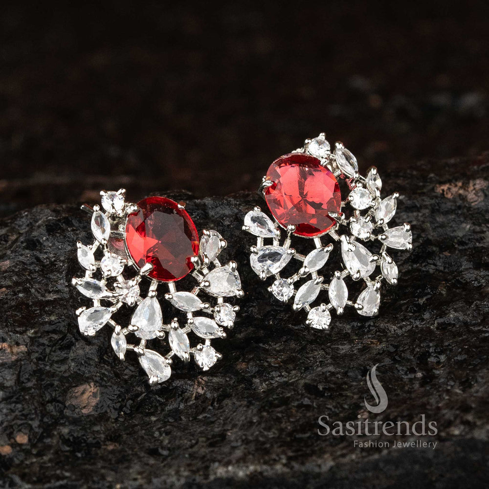 Crimson Luxe Spark rhodium silver earrings with oval tops and red American Diamonds – luxury red partywear jewellery – Sasitrends