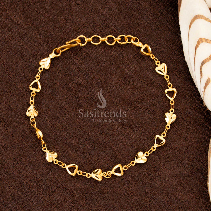 An ornate heart-themed bracelet with intricate gold link patterns, a fusion of vintage and modern styles - Sasitrends