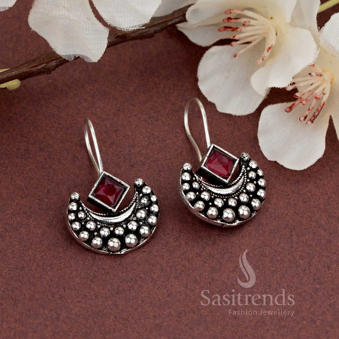 Crescent frame oxidised earrings with bold red square stone, a striking pick for casual and lightwear outfits – Sasitrends