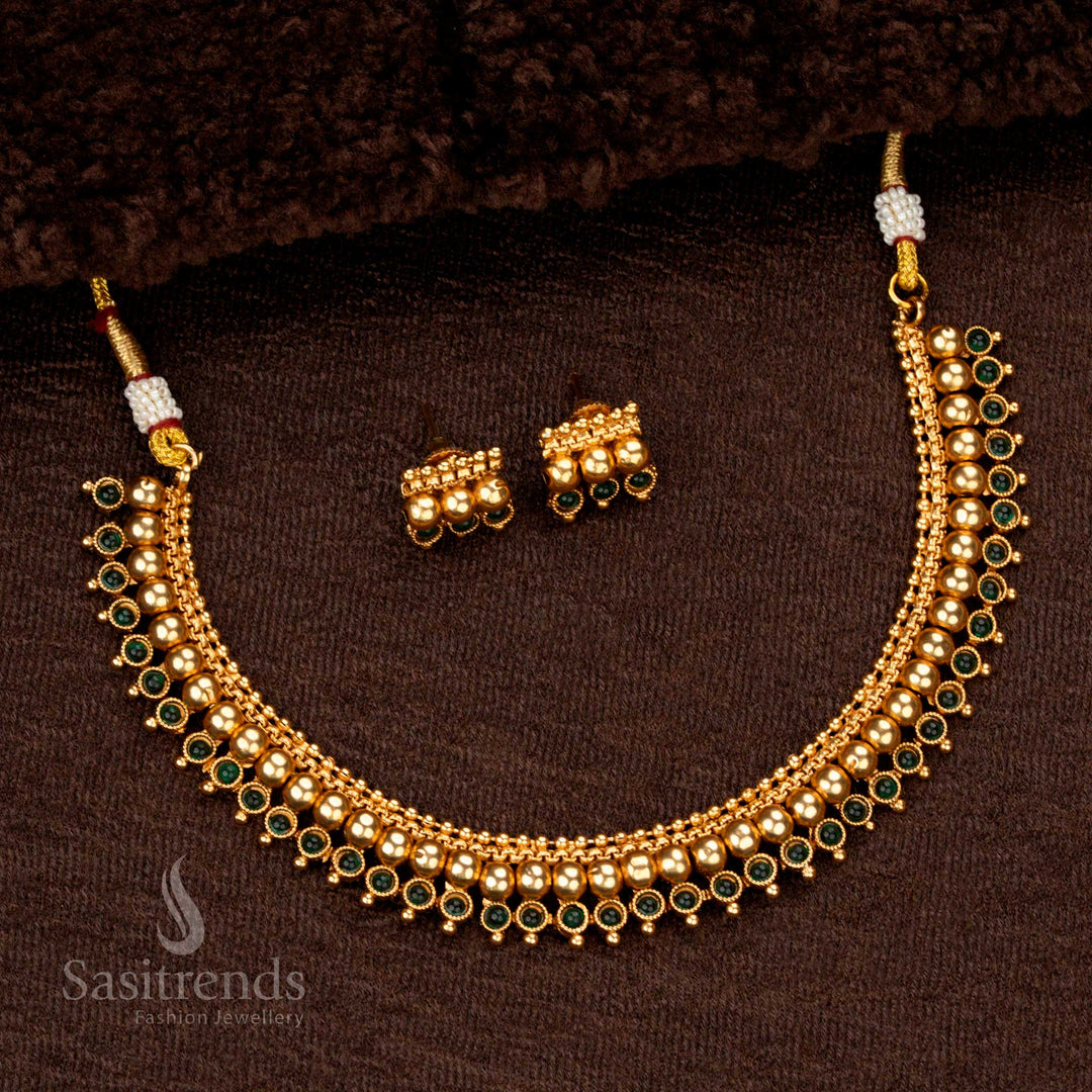 Traditional temple jewellery set with dual-layered beads and ruby-green stone embellishments - Sasitrends