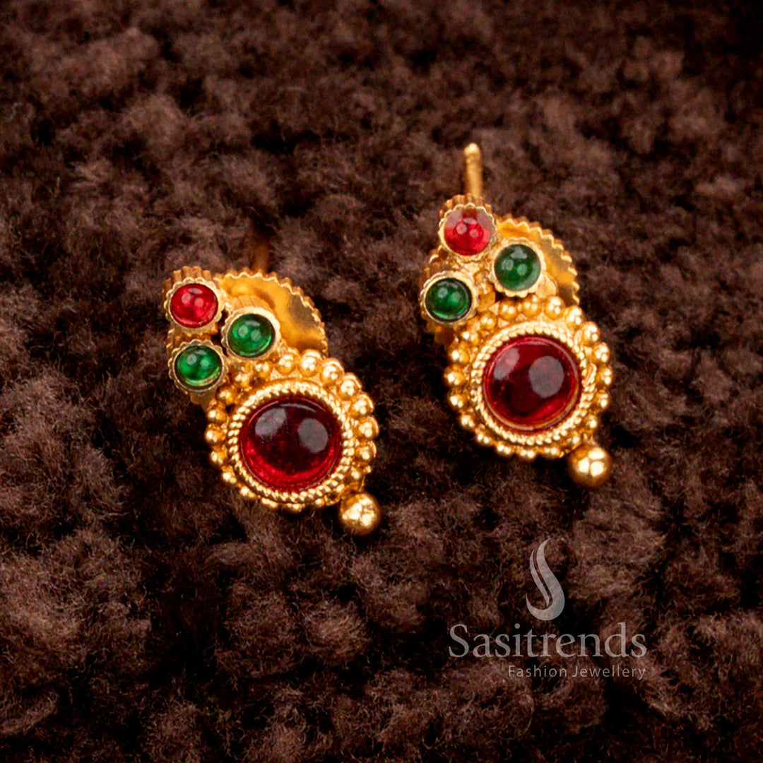 Luxurious matte gold-plated temple Earrings featuring expert handwork, symmetrical round droplet patterns, and an enchanting mix of ruby and green gemstones - Sasitrends