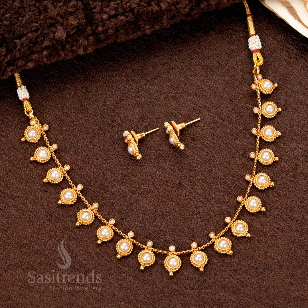 Regal matte gold temple necklace with finely carved round droplet patterns and delicate pearl accents, offering a blend of traditional elegance and timeless beauty - Sasitrends