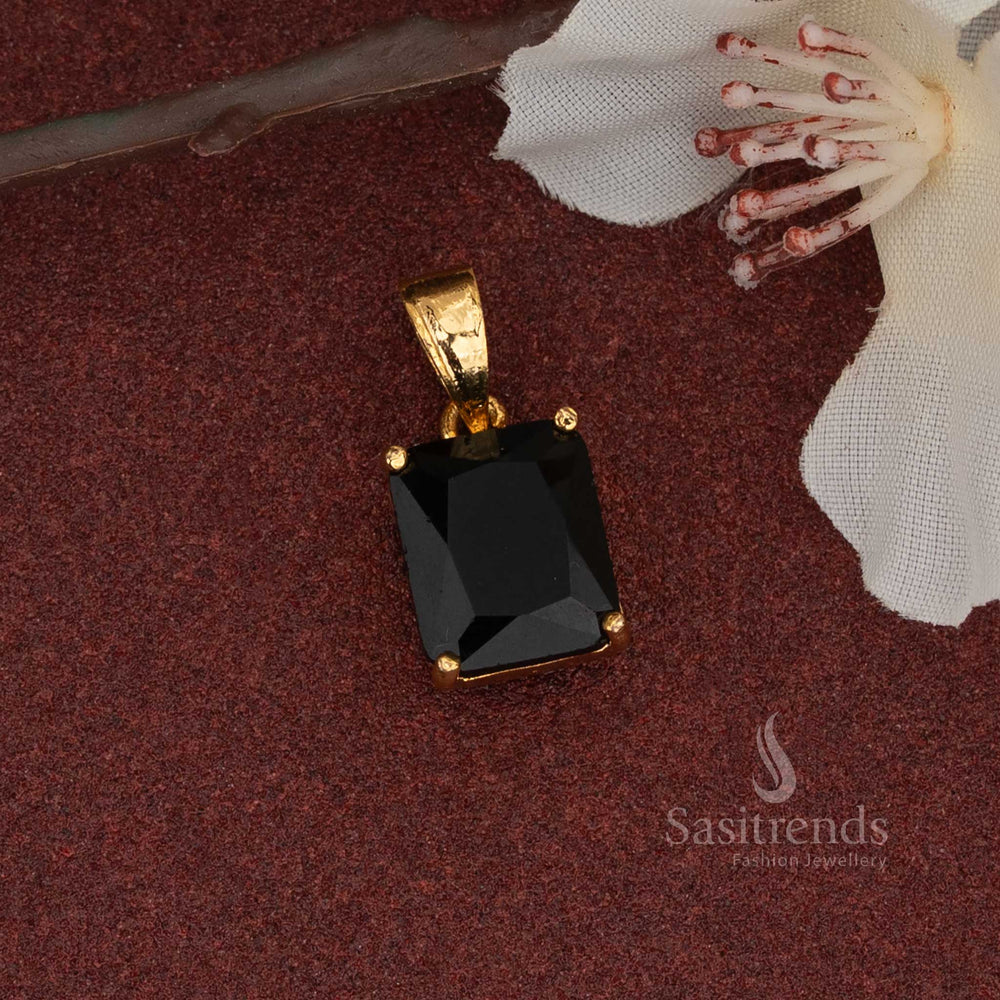 An all-gold AD stone pendant with a secure four-prong setting, perfect for daily wear or special occasions.