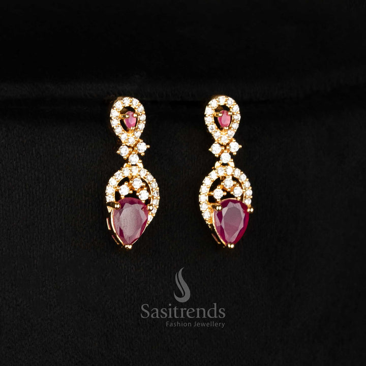Close-up of dazzling American Diamond micro gold plated drop earrings with alternating teardrop accents, SKU 2572E -Sasitrends