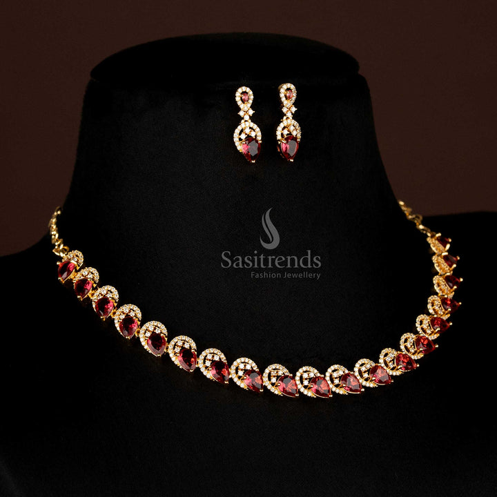 Full view of elegant Red American Diamond micro gold plated teardrop shaped jewellery set, including necklace and matching earrings, perfect for grand occasions - Sasitrends