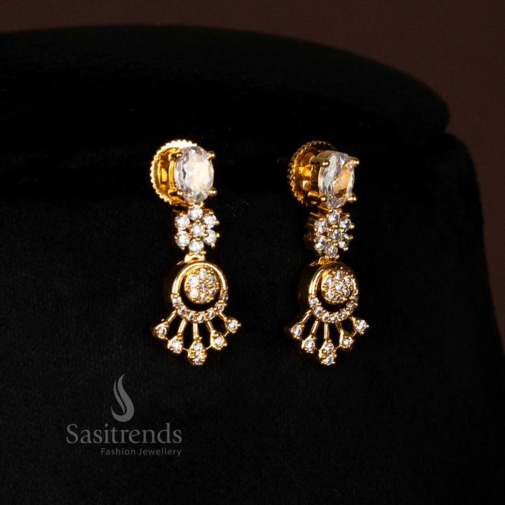 Close-up of dazzling American Diamond micro gold plated drop earrings, showcasing intricate modular construction with oval gems and precisely sculpted fan-shaped AD clusters, SKU 2572G - Sasitrends