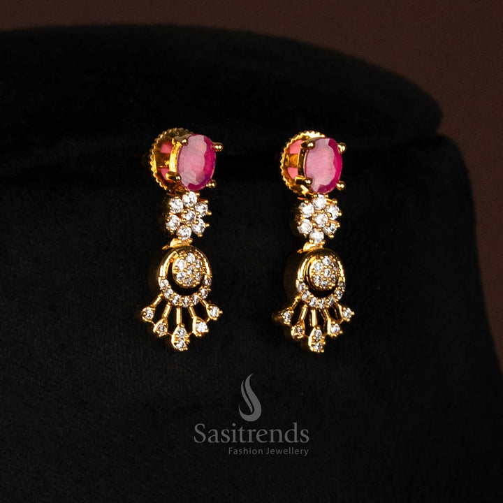 Close-up of dazzling American Diamond micro gold plated drop earrings, showcasing intricate modular construction with oval gems and precisely sculpted fan-shaped AD clusters, SKU 2572G - Sastrends