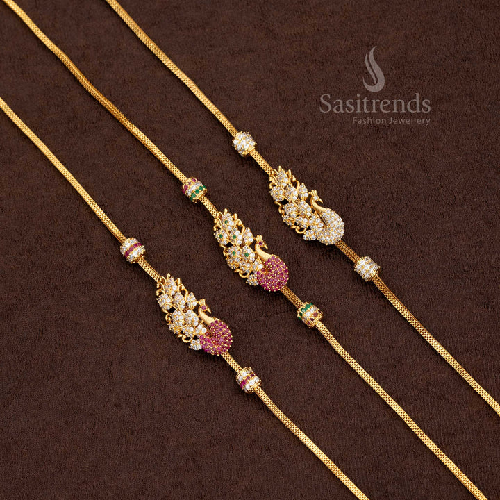 Close-up of a Grand Micro Gold Plated Mugappu Chain, showcasing the intricate peacock and floral design with sparkling American Diamonds and gem accents, SKU 2576F.
