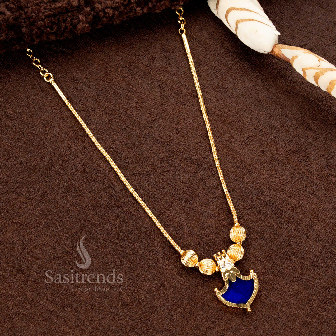 Kerala-style green Palakka necklace featuring shield-shaped pendant and crown design with AD stones – Sasitrends