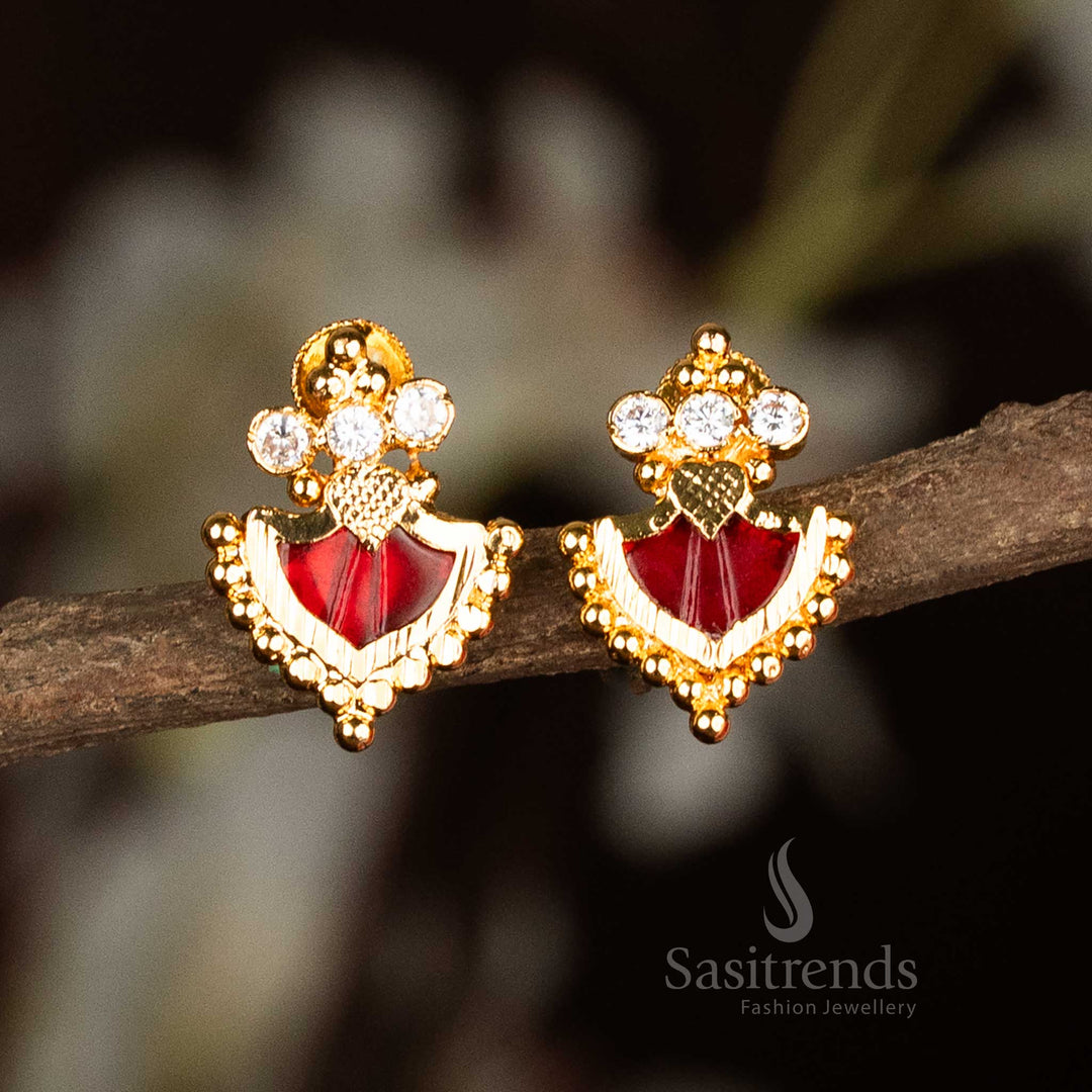 Traditional red Palakka earrings designed in Kerala temple jewellery style, featuring a linear arrangement of three American diamond stones and a radiant micro gold finish – sacred festive jewellery by Sasitrends