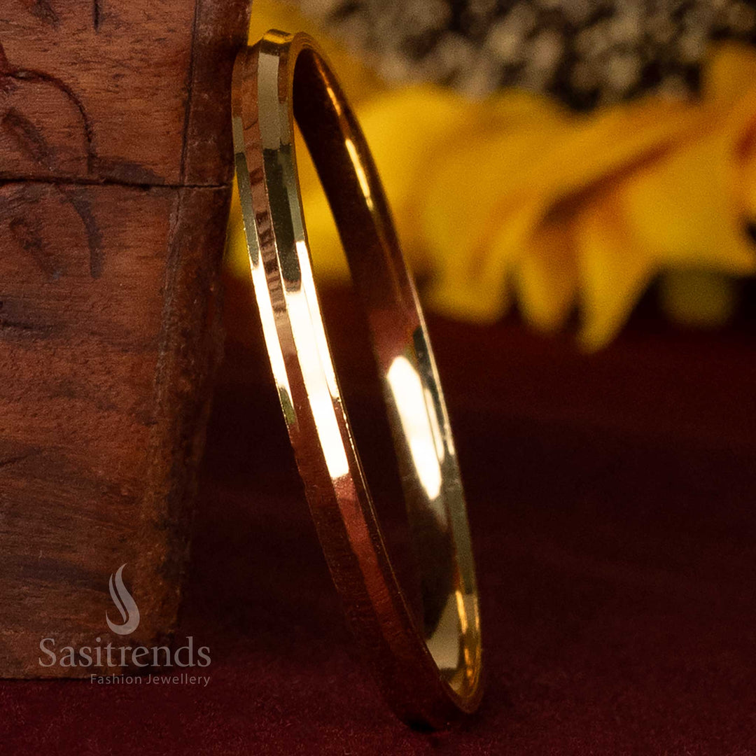 Traditional gold-finish kada bracelet for children, showcasing simple and elegant design - Sasitrends