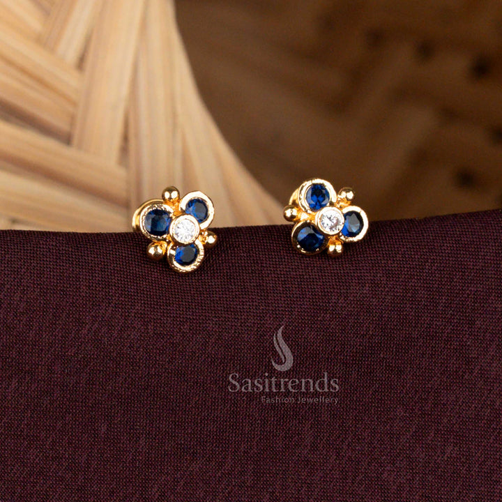 Gold look floral design stud earrings with AD stones by Sasitrends