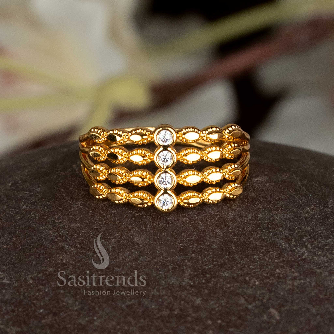 Sasitrends 24k gold plated ring with intricate three-step design.