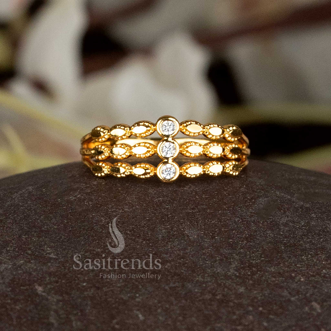 Sasitrends 24k gold plated ring with intricate three-step design.