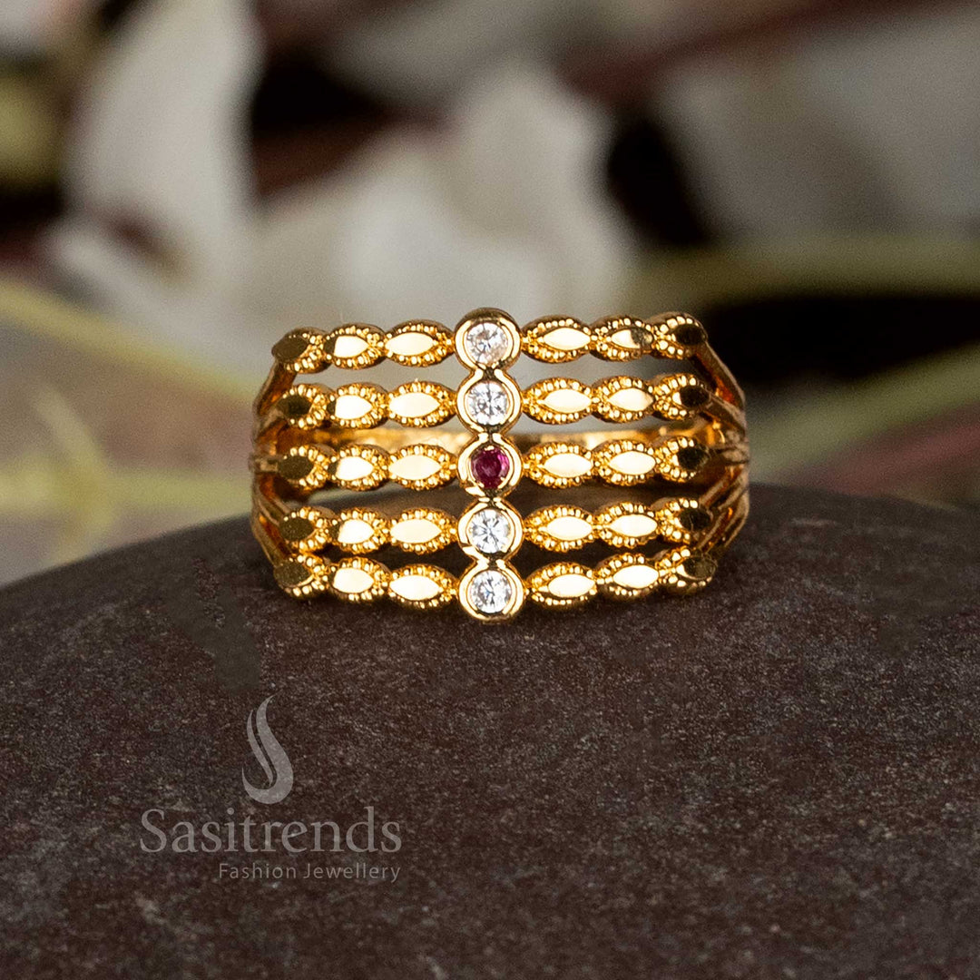 Sasitrends 24k gold plated ring with intricate five-step design.