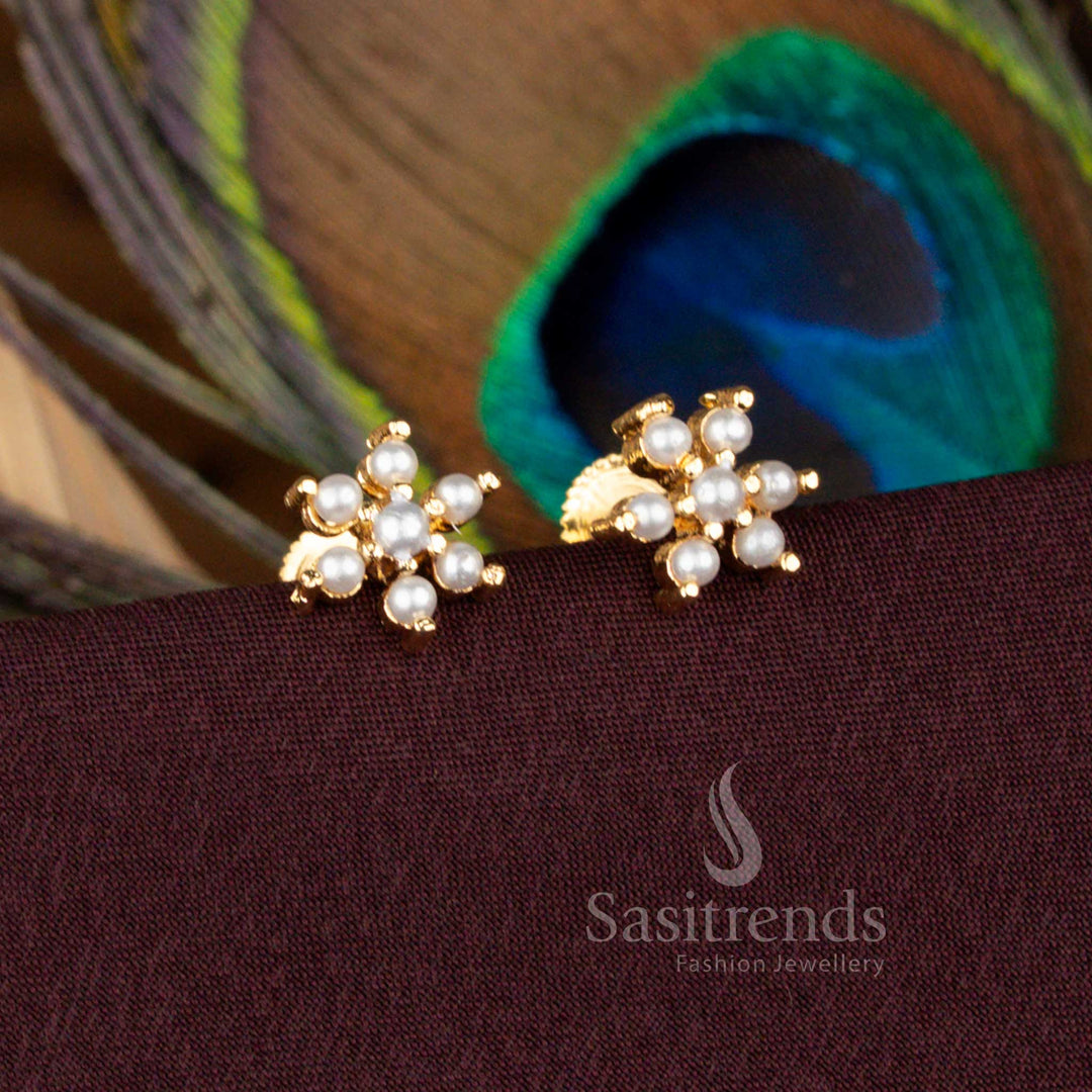 Traditional Six Petal Floral Earrings with Pearls and Pavalam Stones in Gold Finish