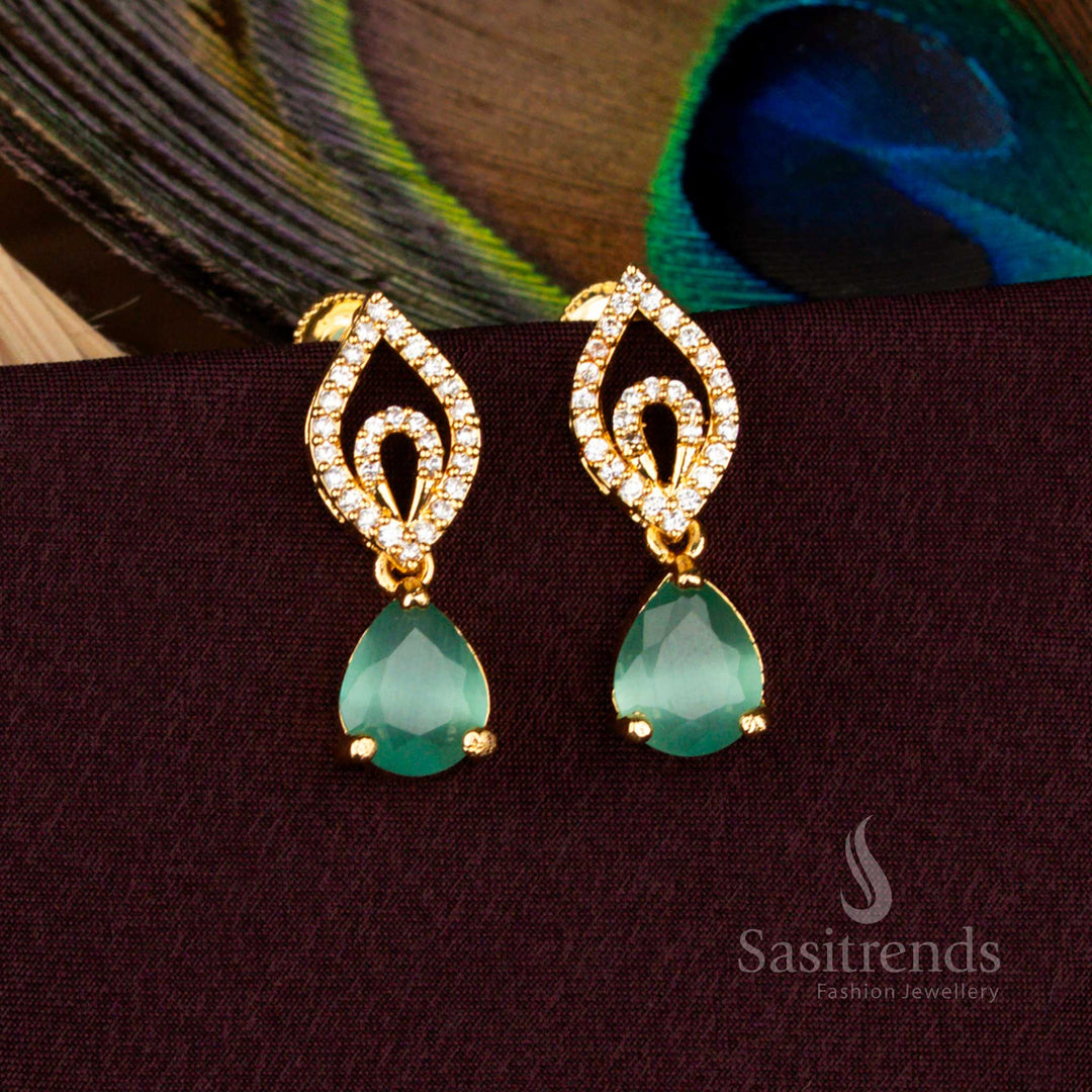 Exquisite micro gold plated screw type teardrop AD stud earrings with 24 carat pure gold shine crafted for wedding and festive wear - Sasitrends