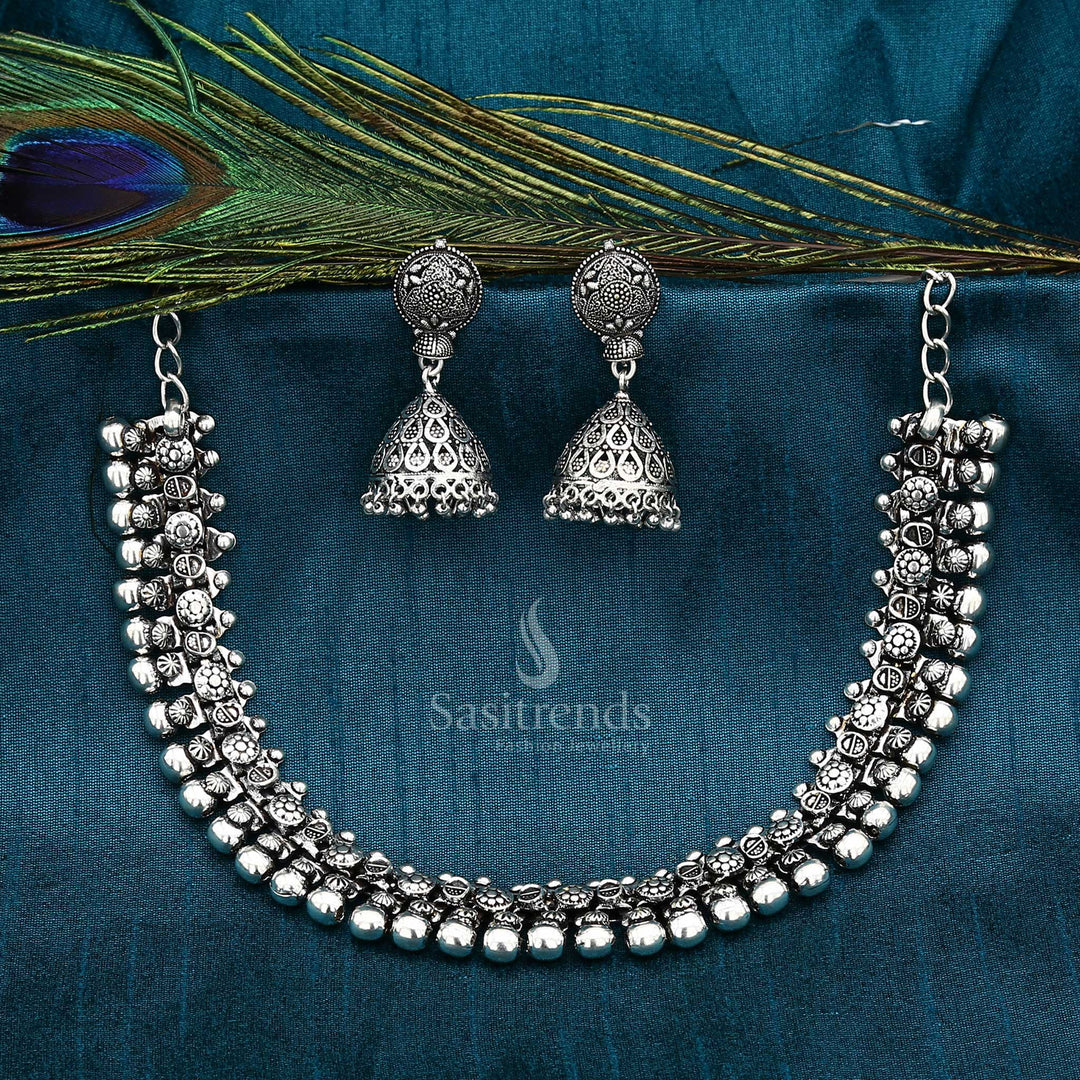 Artisanal oxidised Haara jewellery set featuring a handcrafted long necklace and intricately detailed jhumkas – a bold statement ensemble perfect for temple occasions, tribal fusion styling, and traditional festivals – Sasitrends