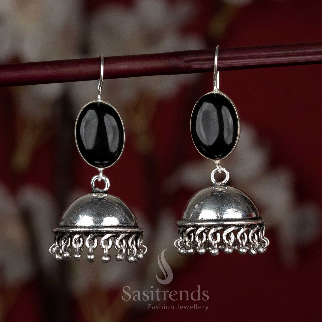 Bold black oxidised jhumkas with oval stone highlight and silver bead accents – perfect for Navaratri nights or contemporary kurti sets – Sasitrends