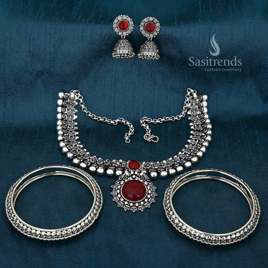 Graceful Legacy Haarini oxidised silver maroon jewellery set adorned with mango leaf motif bangles and an ethnic goddess-inspired necklace for rich traditional elegance – Sasitrends