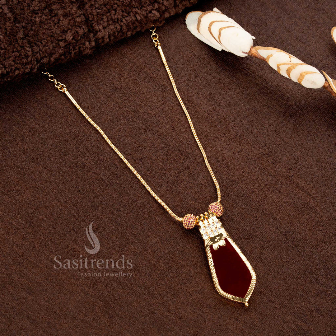 Kerala-style one gram gold plated red Palakka Nagapadam pendant necklace with sparkling AD balls and an intricately designed traditional chain - Sasitrends