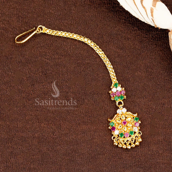 Vibrant multi-colour AD stone floral maang tikka in micro gold plated finish with hanging ball detail, a bold head jewellery statement perfect for festive celebrations – sasitrends