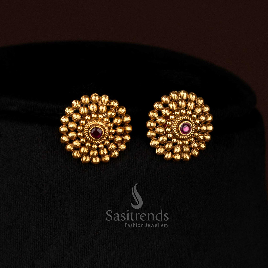 Glimmering ruby matte gold plated temple round floral earrings with AD stones, perfect to wear for festive events and celebratory gatherings – Sasitrends