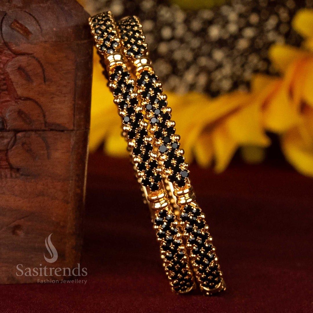 Statement micro gold bangles designed with compact black stone clusters and detailed finish – one gram traditional jewellery set for dramatic festive flair and ethnic poise – Sasitrends
