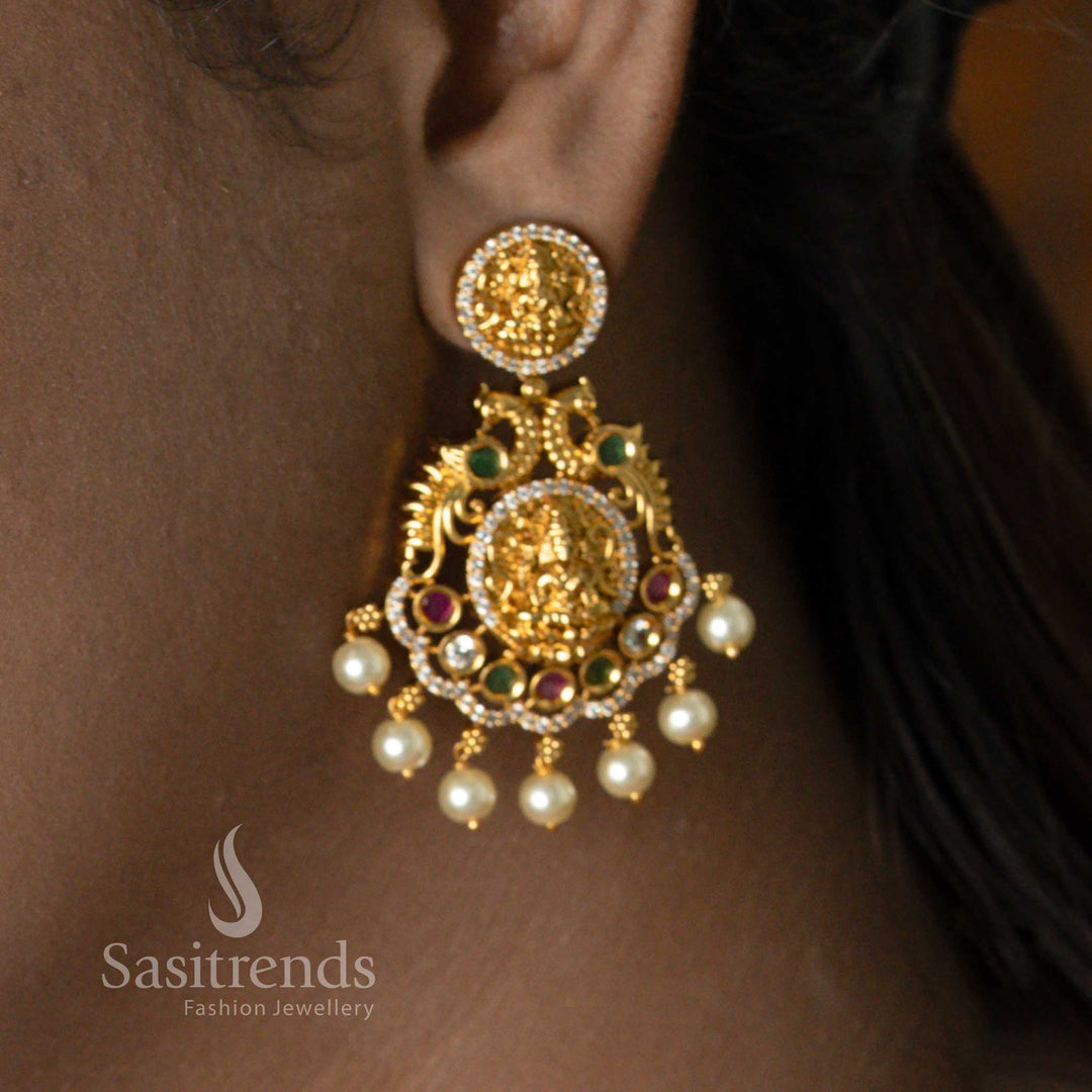 Premium Temple Matte Gold Plated Lakshmi Pendant Earrings Jewellery Set with AD Stones, Pearl Droppings and Round Lakshmi Coin Motifs – Bridal Temple Jewellery on Model - Sasitrends