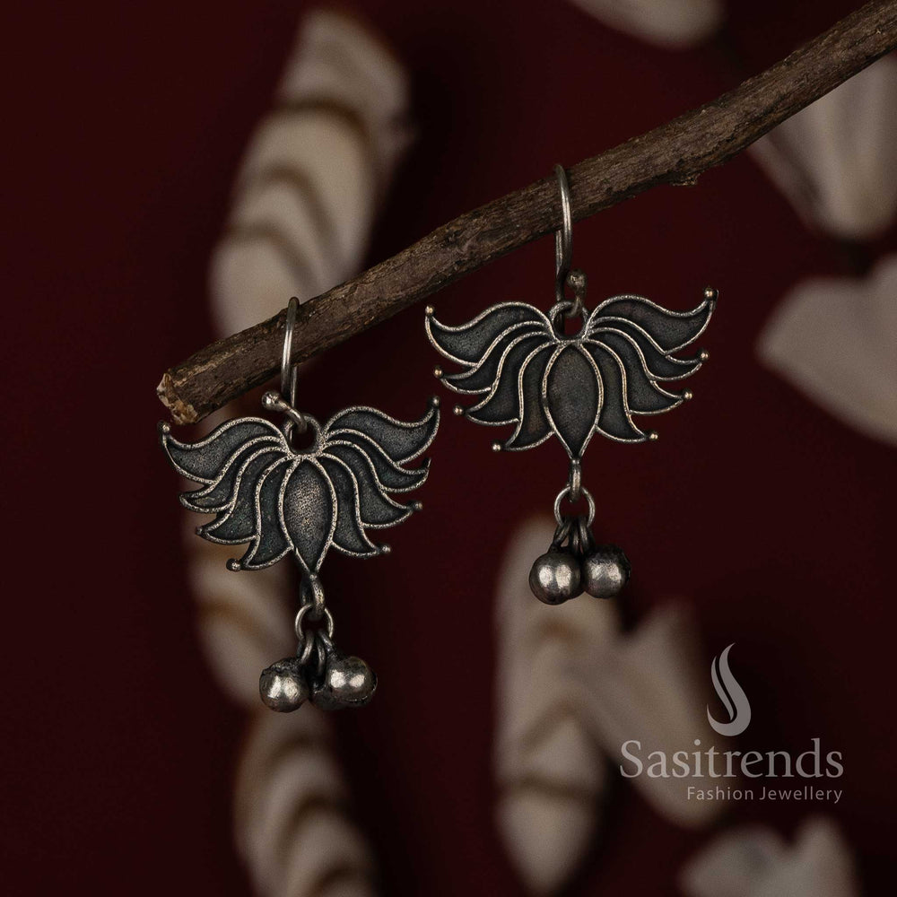 Boho chic lotus fish hook earrings in oxidised silver with hand-etched details and lightweight finish – a trendy fashion jewellery pick for women and girls – Sasitrends